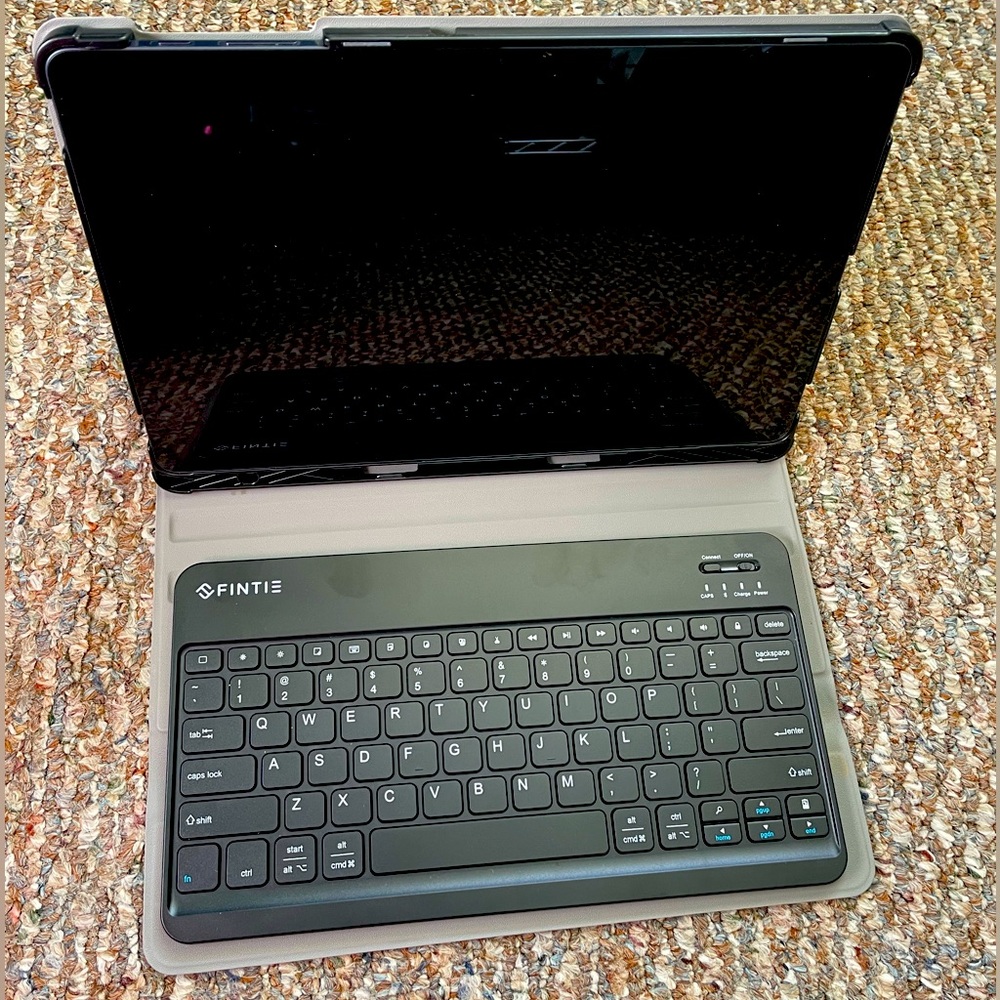 Samsung Tab with stylus, magnetic Fintie case and keyboard.